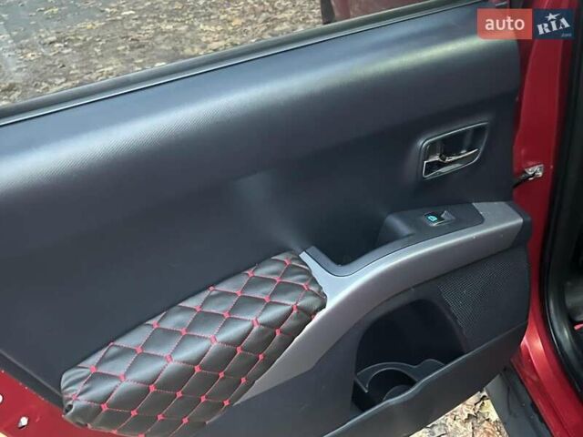 Красный Мицубиси Аутлендер, объемом двигателя 2.4 л и пробегом 251 тыс. км за 8990 $, фото 23 на Automoto.ua