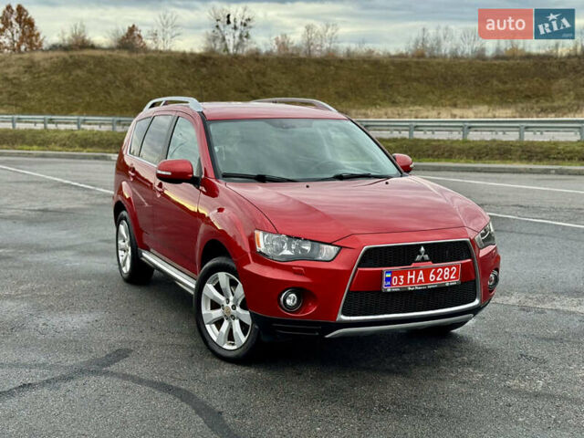 Красный Мицубиси Аутлендер, объемом двигателя 2 л и пробегом 204 тыс. км за 10350 $, фото 43 на Automoto.ua