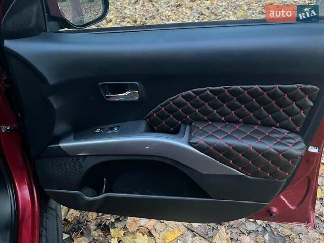 Красный Мицубиси Аутлендер, объемом двигателя 2.4 л и пробегом 251 тыс. км за 8990 $, фото 15 на Automoto.ua