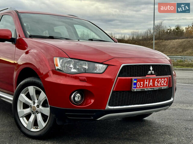 Красный Мицубиси Аутлендер, объемом двигателя 2 л и пробегом 204 тыс. км за 10350 $, фото 9 на Automoto.ua