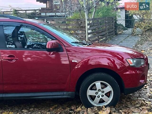 Красный Мицубиси Аутлендер, объемом двигателя 2.4 л и пробегом 251 тыс. км за 8990 $, фото 13 на Automoto.ua