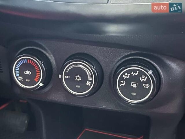 Красный Мицубиси Аутлендер, объемом двигателя 2.4 л и пробегом 251 тыс. км за 8990 $, фото 17 на Automoto.ua