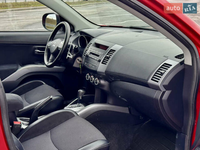 Красный Мицубиси Аутлендер, объемом двигателя 2 л и пробегом 204 тыс. км за 10350 $, фото 31 на Automoto.ua