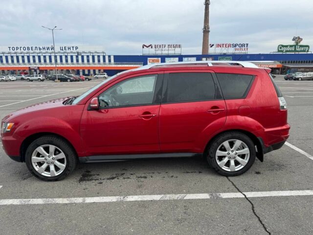 Красный Мицубиси Аутлендер, объемом двигателя 2.4 л и пробегом 201 тыс. км за 9750 $, фото 3 на Automoto.ua