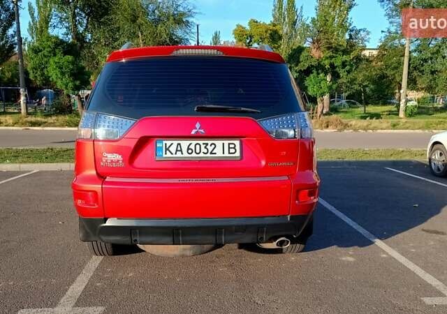 Красный Мицубиси Аутлендер, объемом двигателя 2.36 л и пробегом 236 тыс. км за 9350 $, фото 29 на Automoto.ua