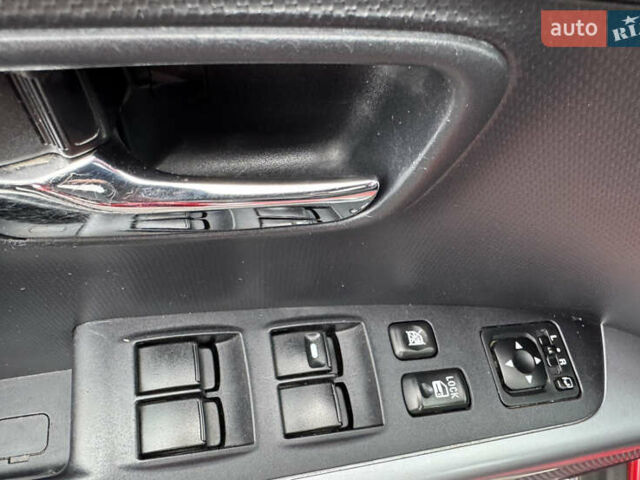 Красный Мицубиси Аутлендер, объемом двигателя 2 л и пробегом 204 тыс. км за 10350 $, фото 28 на Automoto.ua