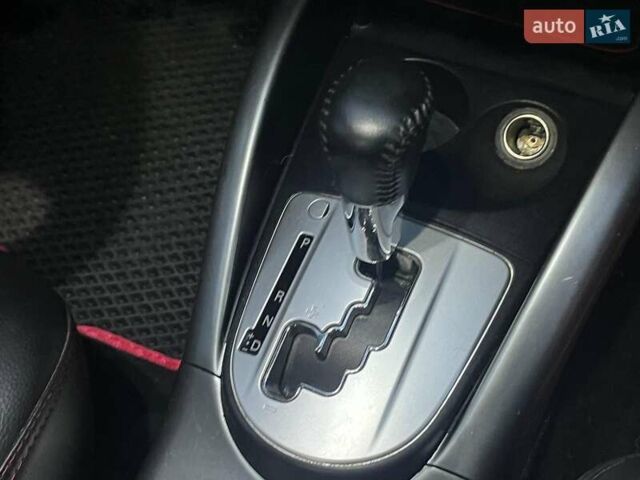 Красный Мицубиси Аутлендер, объемом двигателя 2.4 л и пробегом 251 тыс. км за 8990 $, фото 18 на Automoto.ua