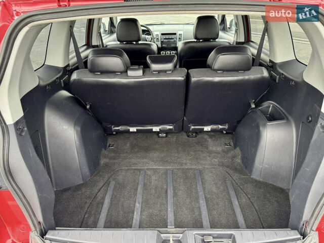 Красный Мицубиси Аутлендер, объемом двигателя 2 л и пробегом 204 тыс. км за 10350 $, фото 38 на Automoto.ua