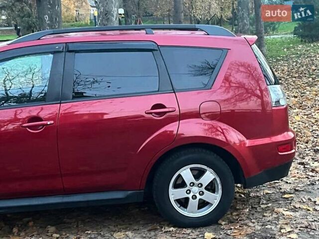 Красный Мицубиси Аутлендер, объемом двигателя 2.4 л и пробегом 251 тыс. км за 8990 $, фото 6 на Automoto.ua