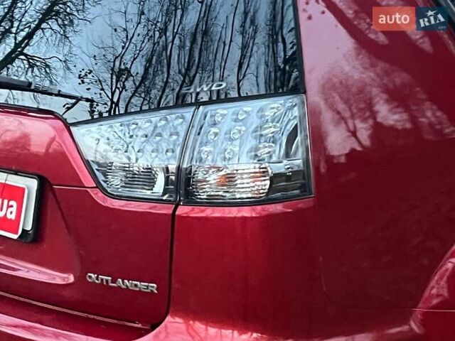 Красный Мицубиси Аутлендер, объемом двигателя 2.4 л и пробегом 251 тыс. км за 8990 $, фото 11 на Automoto.ua
