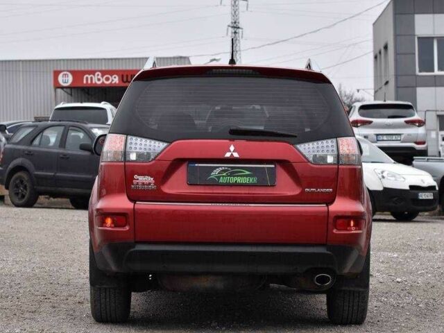 Красный Мицубиси Аутлендер, объемом двигателя 2.4 л и пробегом 204 тыс. км за 9499 $, фото 2 на Automoto.ua