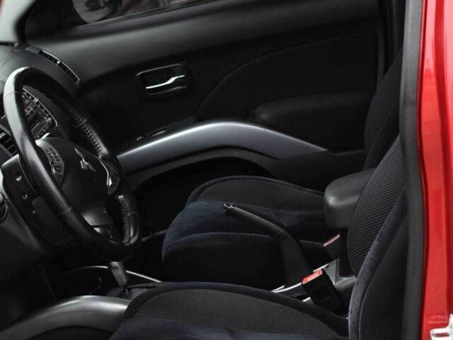 Красный Мицубиси Аутлендер, объемом двигателя 2.4 л и пробегом 204 тыс. км за 9499 $, фото 6 на Automoto.ua