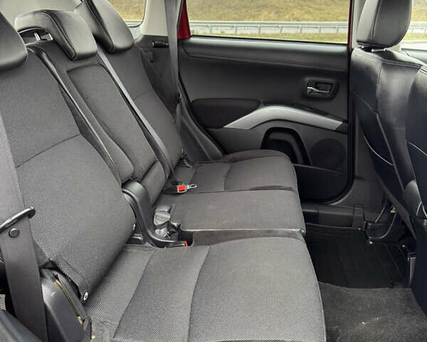 Красный Мицубиси Аутлендер, объемом двигателя 2 л и пробегом 204 тыс. км за 10350 $, фото 36 на Automoto.ua