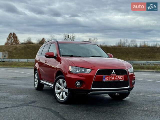 Красный Мицубиси Аутлендер, объемом двигателя 2 л и пробегом 204 тыс. км за 10350 $, фото 41 на Automoto.ua