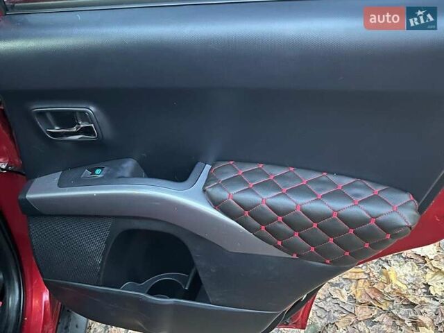 Красный Мицубиси Аутлендер, объемом двигателя 2.4 л и пробегом 251 тыс. км за 8990 $, фото 21 на Automoto.ua