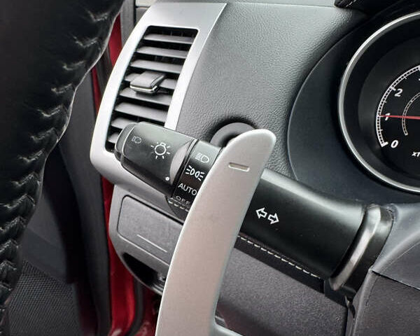 Красный Мицубиси Аутлендер, объемом двигателя 2 л и пробегом 204 тыс. км за 10350 $, фото 22 на Automoto.ua