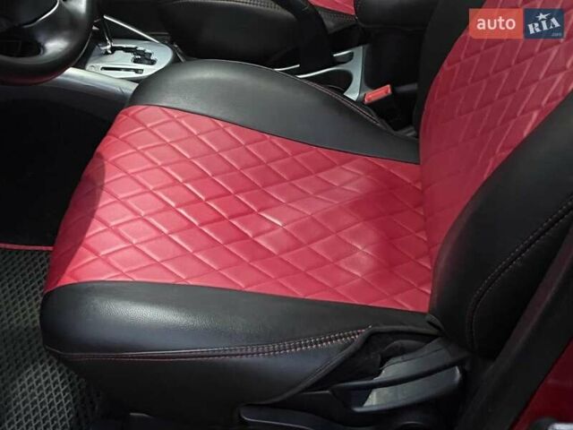 Красный Мицубиси Аутлендер, объемом двигателя 2.4 л и пробегом 251 тыс. км за 8990 $, фото 26 на Automoto.ua