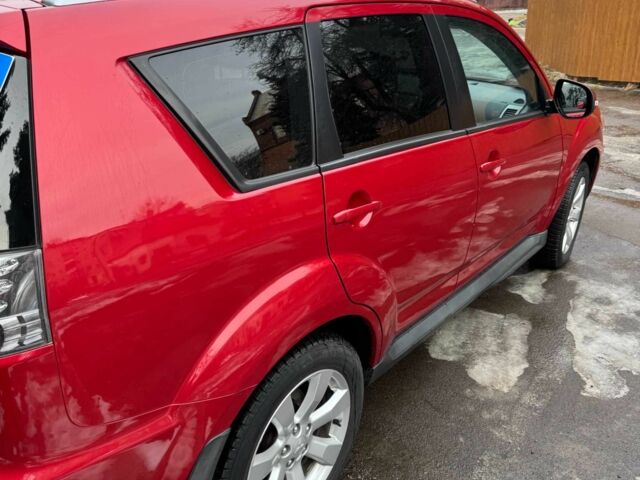 Красный Мицубиси Аутлендер, объемом двигателя 2.4 л и пробегом 201 тыс. км за 9750 $, фото 5 на Automoto.ua