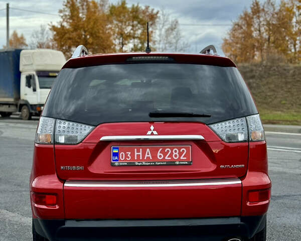 Красный Мицубиси Аутлендер, объемом двигателя 2 л и пробегом 204 тыс. км за 10350 $, фото 5 на Automoto.ua