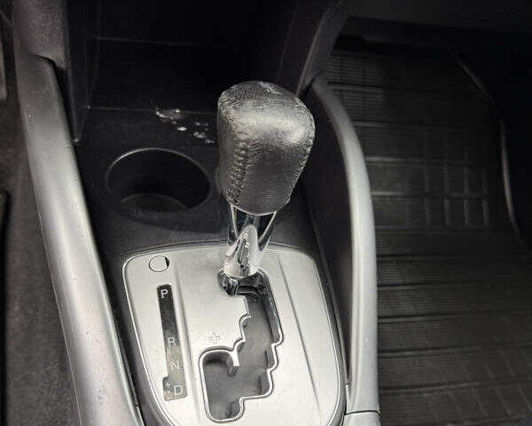 Красный Мицубиси Аутлендер, объемом двигателя 2 л и пробегом 204 тыс. км за 10350 $, фото 24 на Automoto.ua