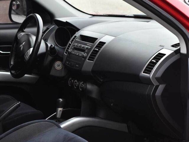 Красный Мицубиси Аутлендер, объемом двигателя 2.4 л и пробегом 204 тыс. км за 9499 $, фото 9 на Automoto.ua