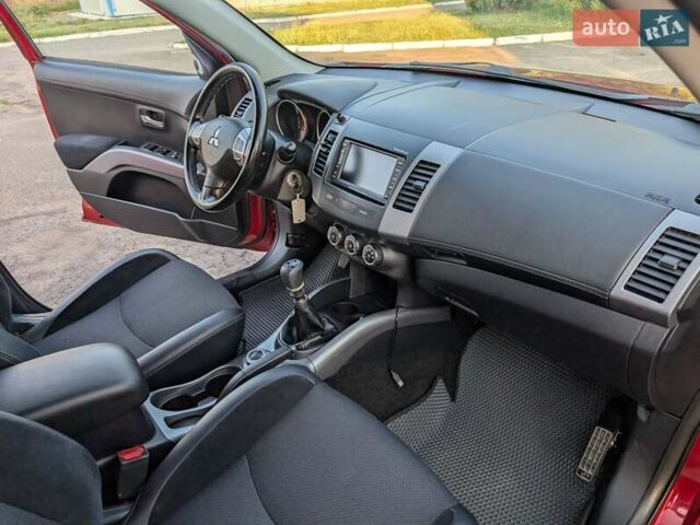 Красный Мицубиси Аутлендер, объемом двигателя 2.27 л и пробегом 250 тыс. км за 9600 $, фото 15 на Automoto.ua