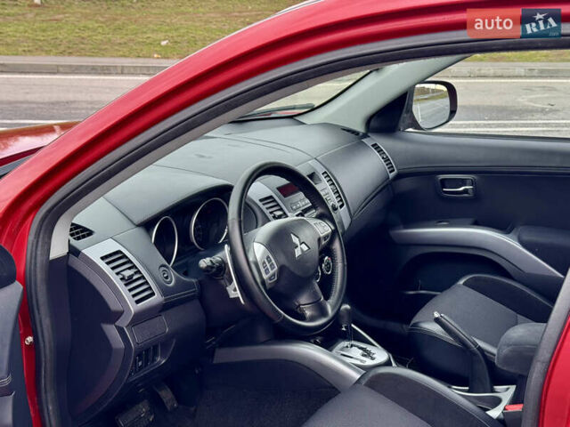 Красный Мицубиси Аутлендер, объемом двигателя 2 л и пробегом 204 тыс. км за 10350 $, фото 17 на Automoto.ua