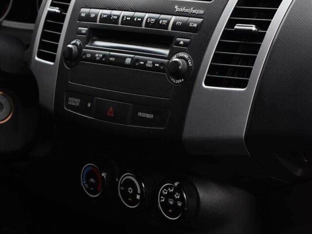 Красный Мицубиси Аутлендер, объемом двигателя 2.4 л и пробегом 204 тыс. км за 9499 $, фото 11 на Automoto.ua