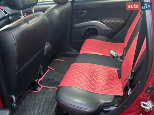 Красный Мицубиси Аутлендер, объемом двигателя 2.4 л и пробегом 251 тыс. км за 8990 $, фото 22 на Automoto.ua