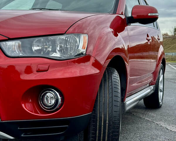 Красный Мицубиси Аутлендер, объемом двигателя 2 л и пробегом 204 тыс. км за 10350 $, фото 13 на Automoto.ua