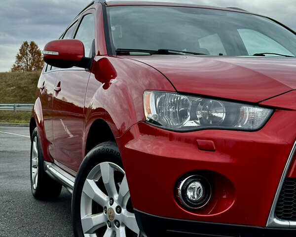 Красный Мицубиси Аутлендер, объемом двигателя 2 л и пробегом 204 тыс. км за 10350 $, фото 10 на Automoto.ua