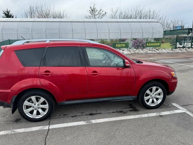 Красный Мицубиси Аутлендер, объемом двигателя 2.4 л и пробегом 201 тыс. км за 9750 $, фото 2 на Automoto.ua