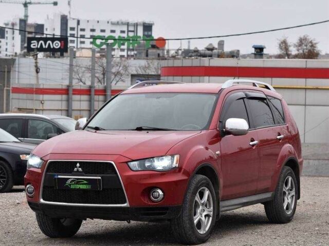 Красный Мицубиси Аутлендер, объемом двигателя 2.4 л и пробегом 204 тыс. км за 9499 $, фото 4 на Automoto.ua