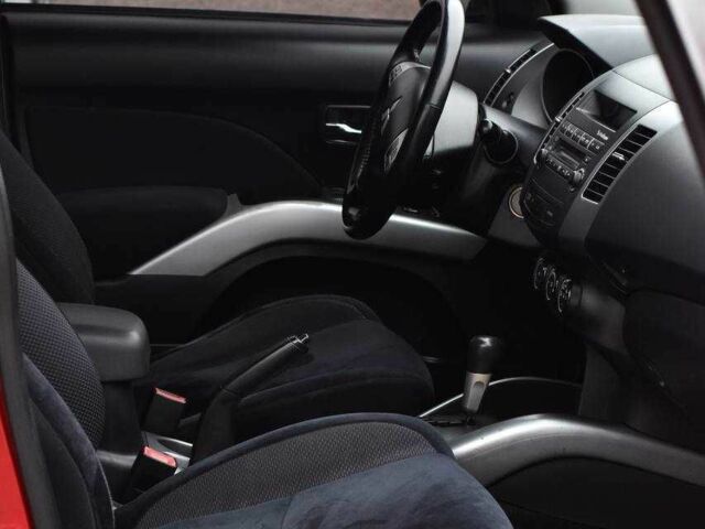 Красный Мицубиси Аутлендер, объемом двигателя 2.4 л и пробегом 204 тыс. км за 9499 $, фото 10 на Automoto.ua