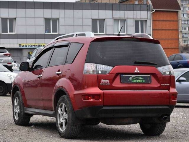 Красный Мицубиси Аутлендер, объемом двигателя 2.4 л и пробегом 204 тыс. км за 9499 $, фото 3 на Automoto.ua