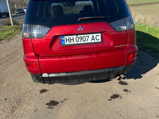 Міцубісі Аутлендер 2011 у Чорноморську (Іллічівську) на Automoto.ua Червоний Міцубісі Аутлендер, об'ємом двигуна 3 л та пробігом 200 тис. км за 11000 $, фото 2 на Automoto.ua
