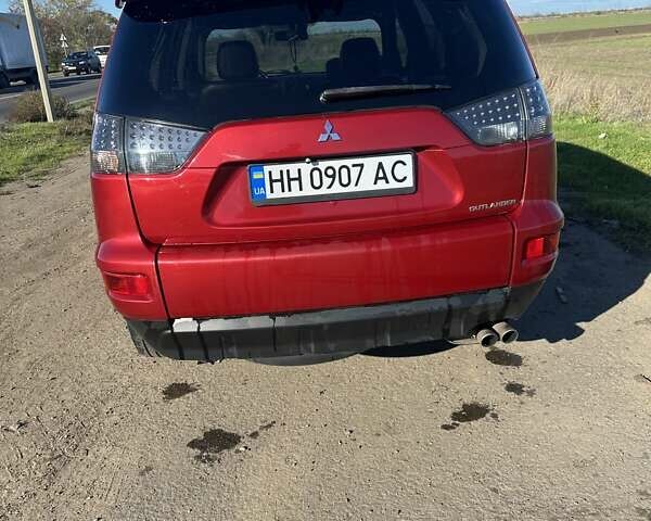 Міцубісі Аутлендер 2011 у Чорноморську (Іллічівську) на Automoto.ua Червоний Міцубісі Аутлендер, об'ємом двигуна 3 л та пробігом 200 тис. км за 11000 $, фото 1 на Automoto.ua