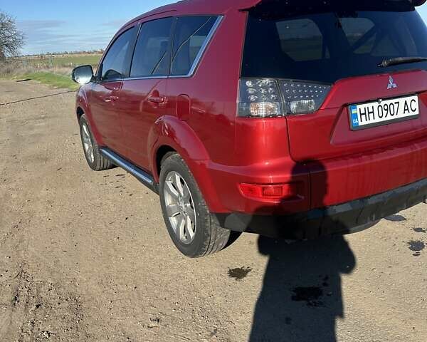 Міцубісі Аутлендер 2011 у Чорноморську (Іллічівську) на Automoto.ua Червоний Міцубісі Аутлендер, об'ємом двигуна 3 л та пробігом 200 тис. км за 11000 $, фото 4 на Automoto.ua