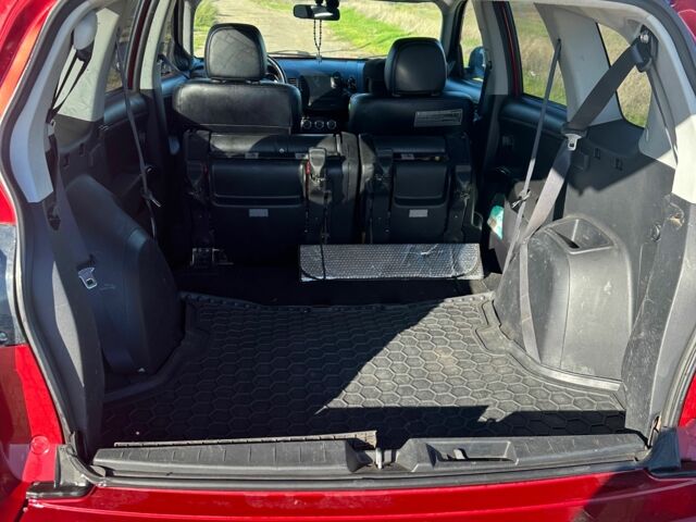 Міцубісі Аутлендер 2011 у Чорноморську (Іллічівську) на Automoto.ua Червоний Міцубісі Аутлендер, об'ємом двигуна 3 л та пробігом 200 тис. км за 11000 $, фото 7 на Automoto.ua