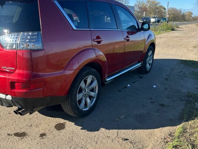 Міцубісі Аутлендер 2011 у Чорноморську (Іллічівську) на Automoto.ua Червоний Міцубісі Аутлендер, об'ємом двигуна 3 л та пробігом 200 тис. км за 11000 $, фото 3 на Automoto.ua