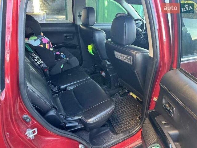 Міцубісі Аутлендер 2011 у Чорноморську (Іллічівську) на Automoto.ua Червоний Міцубісі Аутлендер, об'ємом двигуна 3 л та пробігом 200 тис. км за 11000 $, фото 9 на Automoto.ua