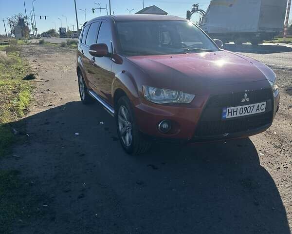 Міцубісі Аутлендер 2011 у Чорноморську (Іллічівську) на Automoto.ua Червоний Міцубісі Аутлендер, об'ємом двигуна 3 л та пробігом 200 тис. км за 11000 $, фото 5 на Automoto.ua
