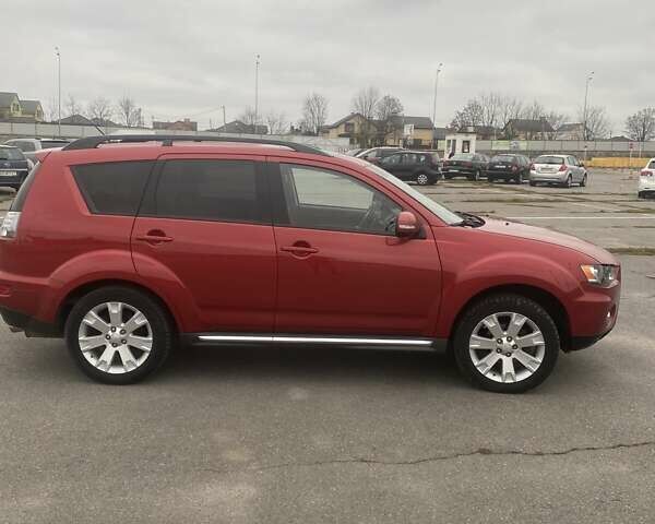 Красный Мицубиси Аутлендер, объемом двигателя 2.36 л и пробегом 210 тыс. км за 11800 $, фото 5 на Automoto.ua