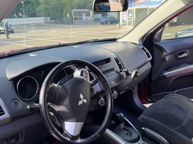 Красный Мицубиси Аутлендер, объемом двигателя 2 л и пробегом 269 тыс. км за 8700 $, фото 11 на Automoto.ua