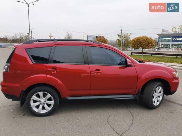 Красный Мицубиси Аутлендер, объемом двигателя 2.36 л и пробегом 93 тыс. км за 11499 $, фото 4 на Automoto.ua