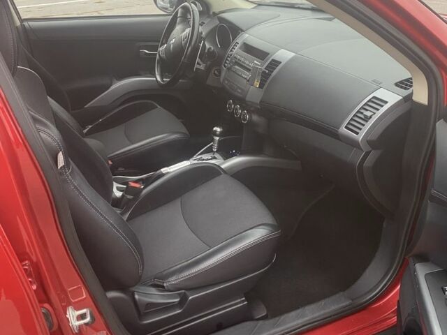 Красный Мицубиси Аутлендер, объемом двигателя 2.4 л и пробегом 210 тыс. км за 11800 $, фото 17 на Automoto.ua