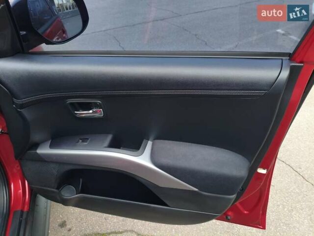 Красный Мицубиси Аутлендер, объемом двигателя 2.36 л и пробегом 93 тыс. км за 11499 $, фото 25 на Automoto.ua