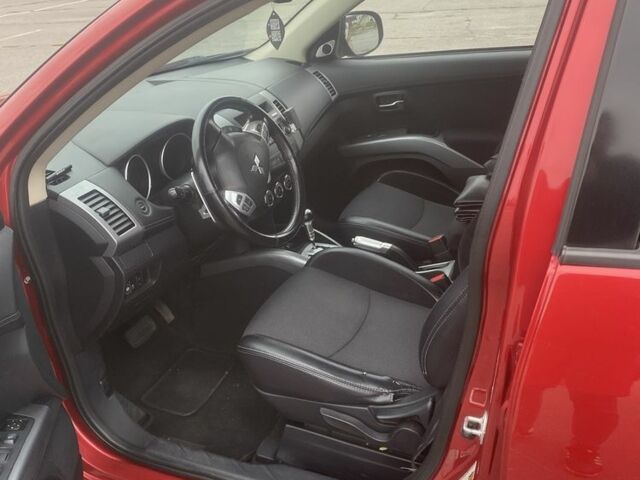 Красный Мицубиси Аутлендер, объемом двигателя 2.4 л и пробегом 210 тыс. км за 11800 $, фото 19 на Automoto.ua