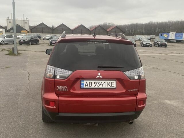 Красный Мицубиси Аутлендер, объемом двигателя 2.4 л и пробегом 210 тыс. км за 11800 $, фото 14 на Automoto.ua