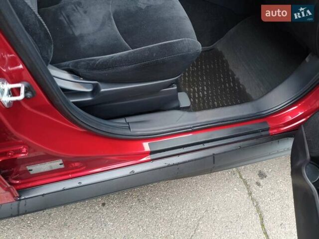 Красный Мицубиси Аутлендер, объемом двигателя 2.36 л и пробегом 93 тыс. км за 11499 $, фото 26 на Automoto.ua